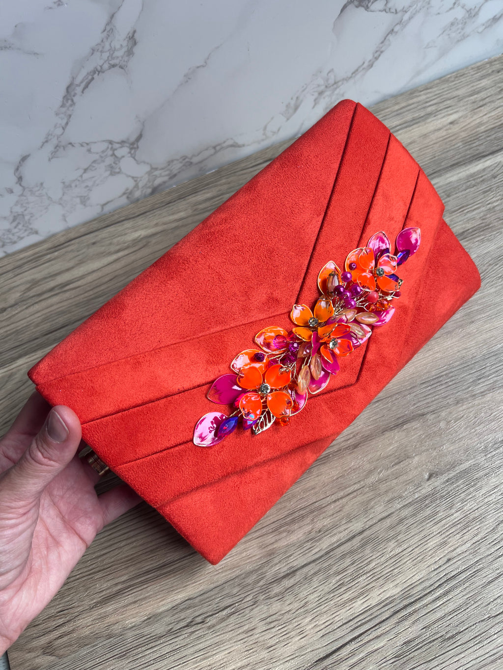 Orange and fucshia side headpiece and bag