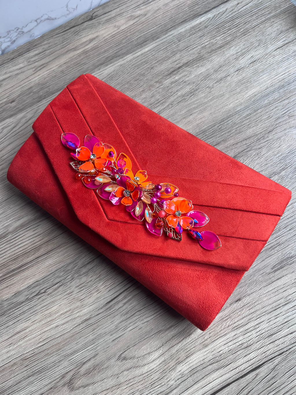 Orange and fucshia side headpiece and bag