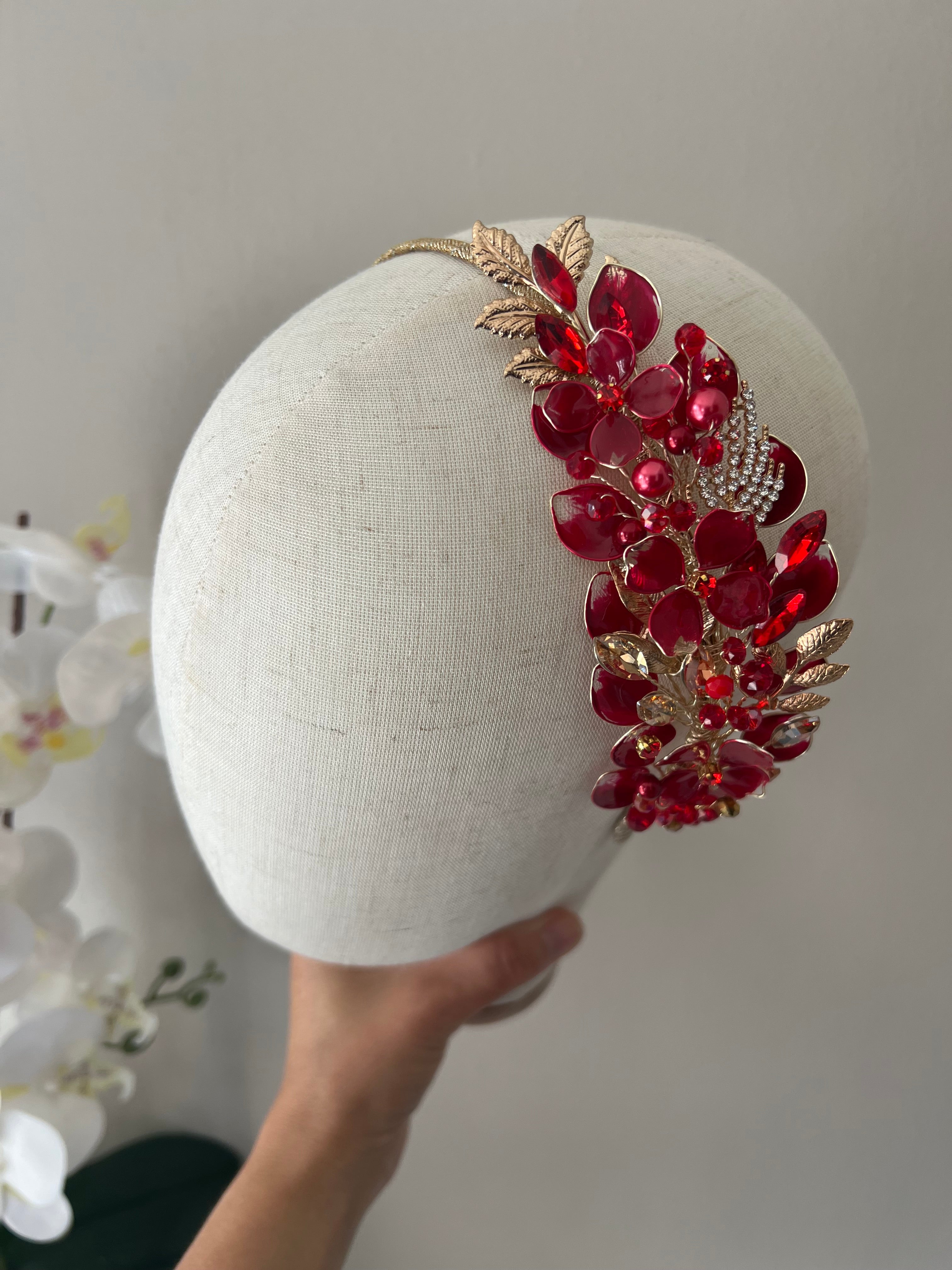Red side wedding guest headpiece