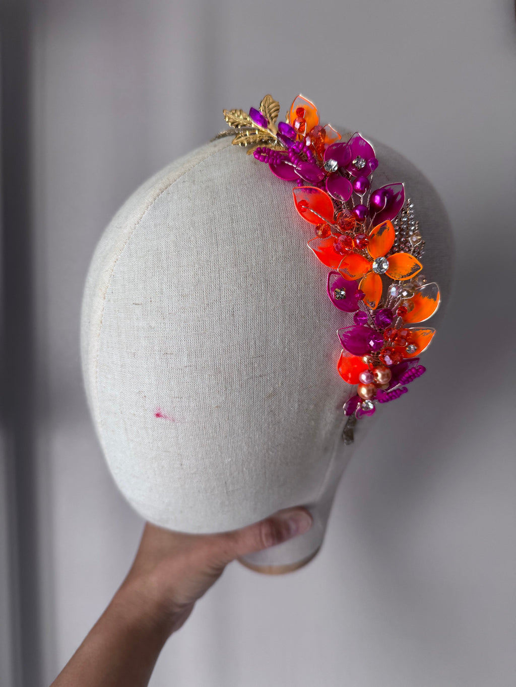 Orange and fucshia side headpiece and bag