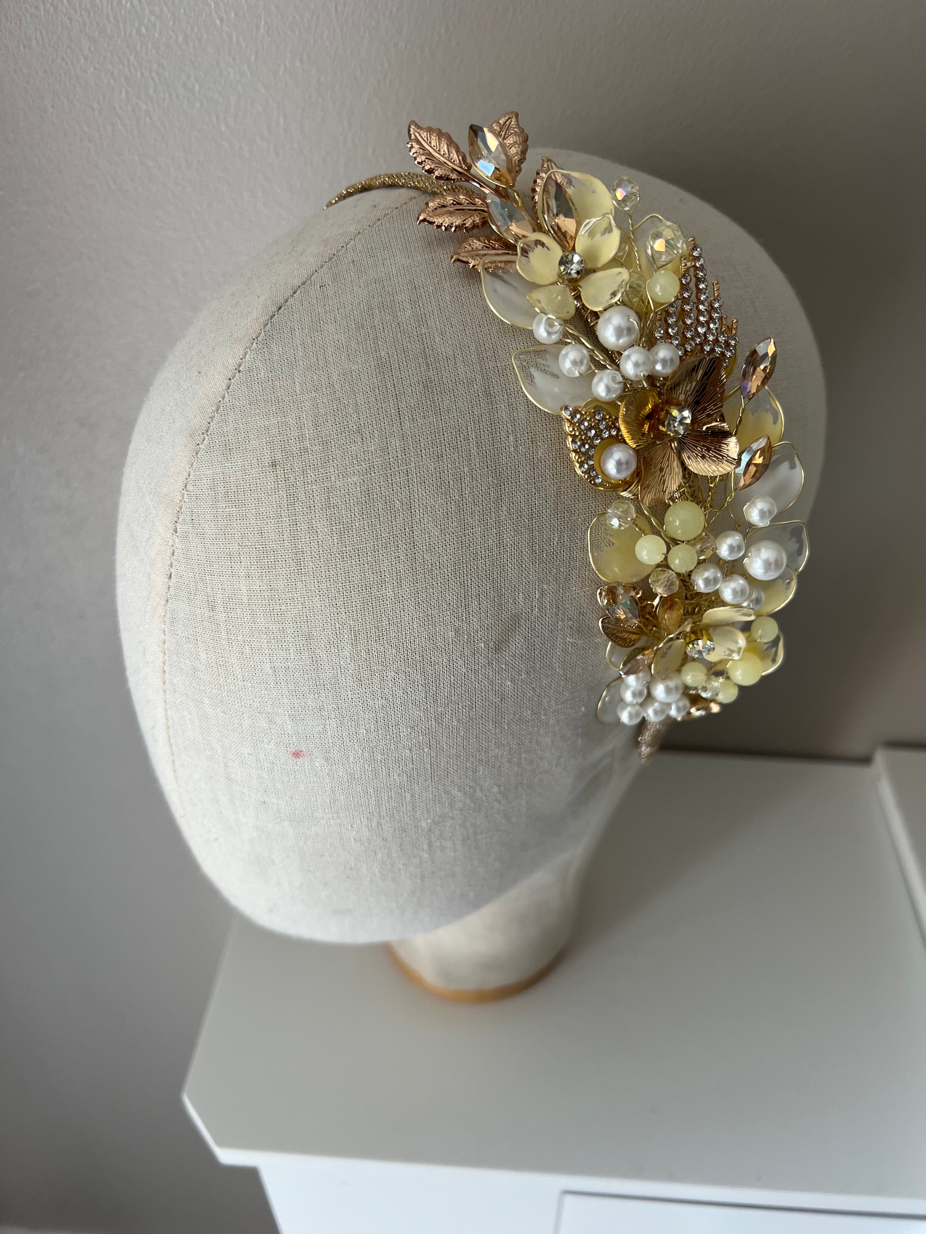 Pale yellow and Gold side wedding guest Heapdiece