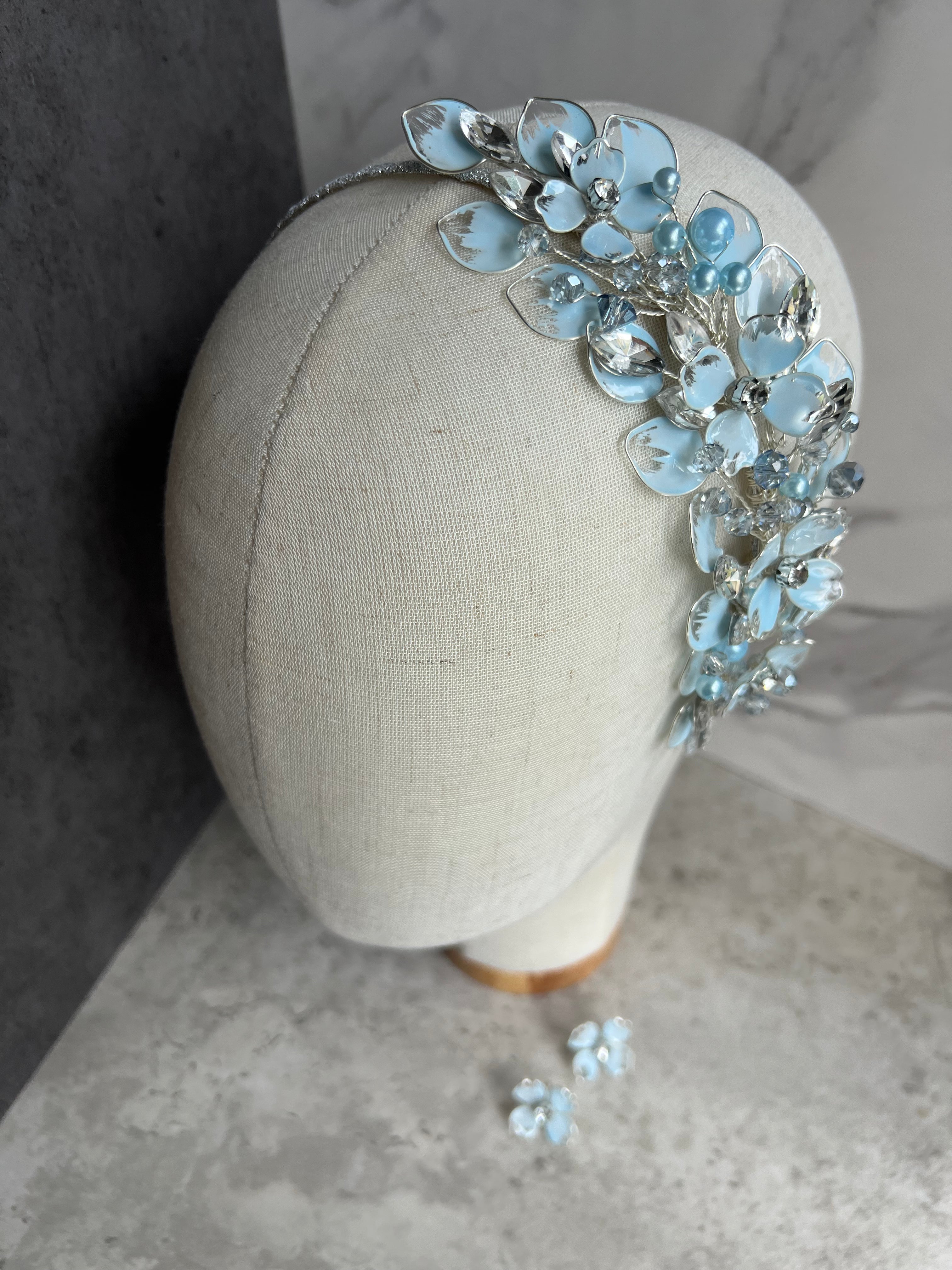 Light blue and silver side wedding guest Heapdiece