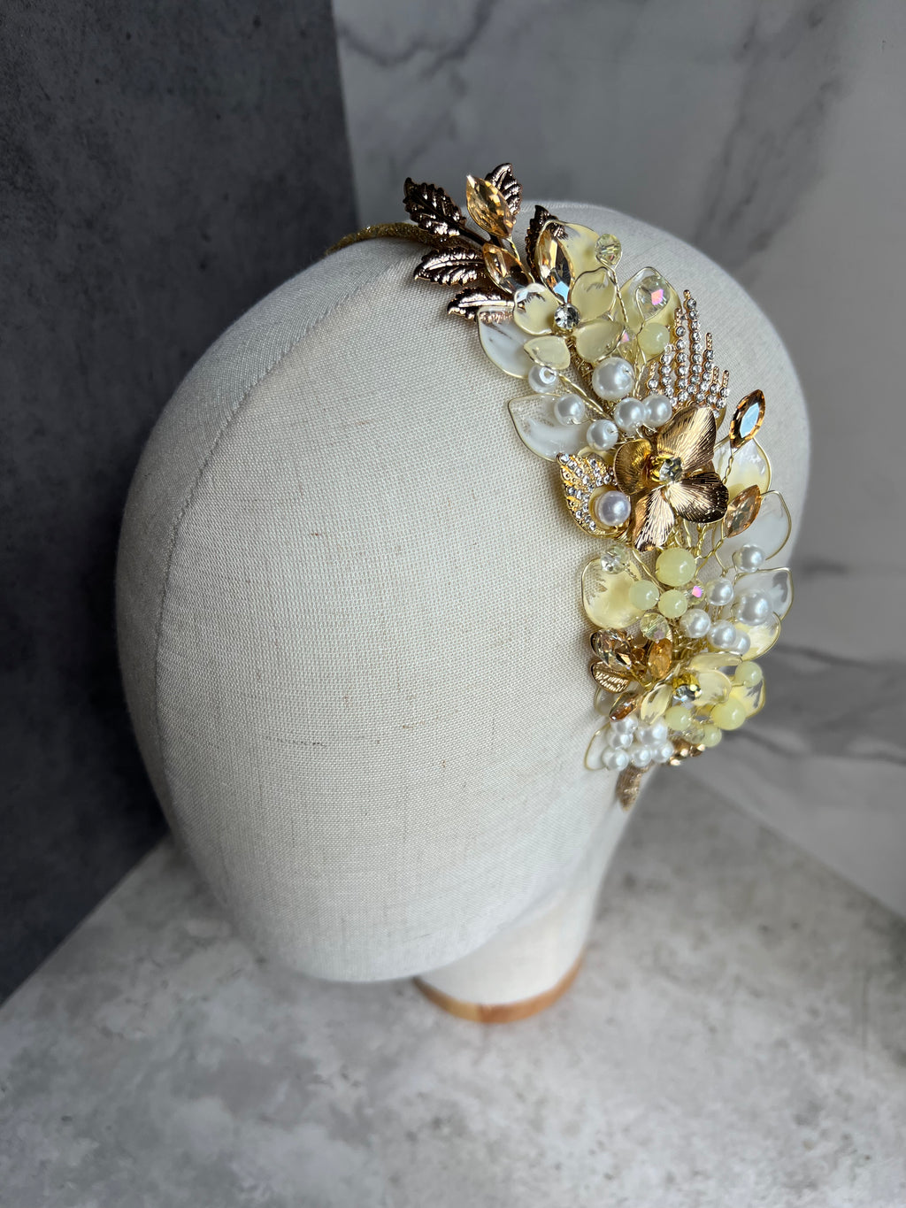 Pale yellow and Gold side wedding guest Heapdiece